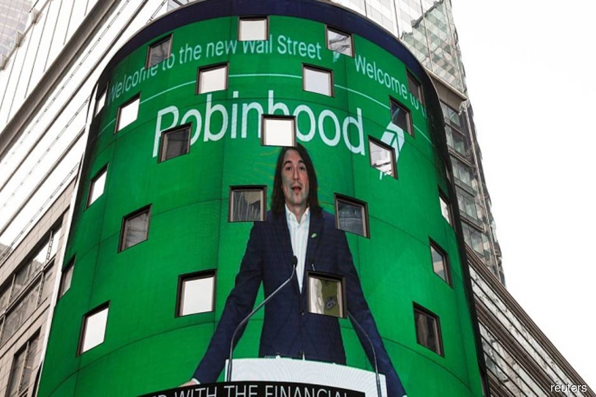 Vlad Tenev, CEO and co-founder Robinhood Markets, Inc, is displayed on a screen during his company’s IPO at the Nasdaq Market site in Times Square in New York City, US on Thursday, July 29, 2021. (Photo by Brendan McDermid/Reuters)